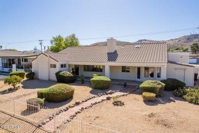 Experience the perfect blend of luxury and tranquility in this on Moon Valley Country Club  in Arizona - for sale on GolfHomes.com, golf home, golf lot