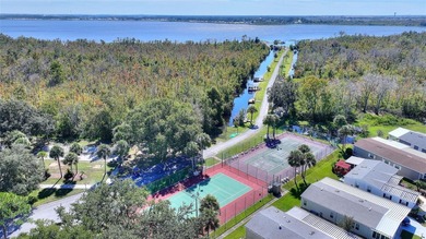 This beautifully maintained, Sun Manufactured home is ONE OF THE on Sweetwater Golf and Tennis Club in Florida - for sale on GolfHomes.com, golf home, golf lot
