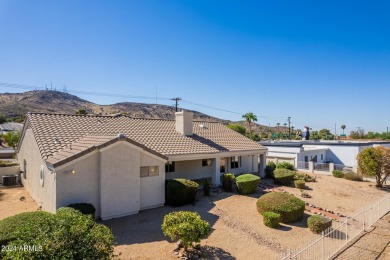 Experience the perfect blend of luxury and tranquility in this on Moon Valley Country Club  in Arizona - for sale on GolfHomes.com, golf home, golf lot