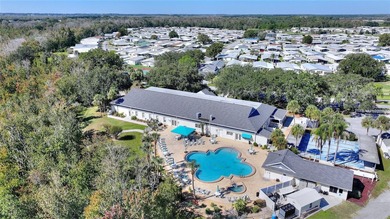 This beautifully maintained, Sun Manufactured home is ONE OF THE on Sweetwater Golf and Tennis Club in Florida - for sale on GolfHomes.com, golf home, golf lot