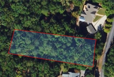 Welcome to this beautifully wooded lot nestled in the heart of on The Highlands Course at Lake Arrowhead in Georgia - for sale on GolfHomes.com, golf home, golf lot