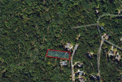 Welcome to this beautifully wooded lot nestled in the heart of on The Highlands Course at Lake Arrowhead in Georgia - for sale on GolfHomes.com, golf home, golf lot