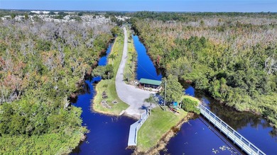 This beautifully maintained, Sun Manufactured home is ONE OF THE on Sweetwater Golf and Tennis Club in Florida - for sale on GolfHomes.com, golf home, golf lot