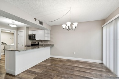 Under contract-accepting backup offers. First-Floor Availability on East Bay Golf Club in Florida - for sale on GolfHomes.com, golf home, golf lot