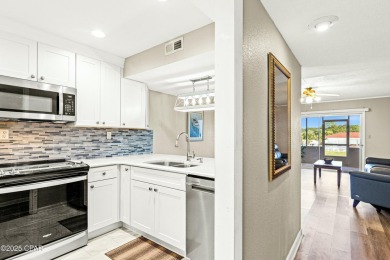 Discover a hidden gem in the heart of Panama City Beach--Leisure on Holiday Golf Club in Florida - for sale on GolfHomes.com, golf home, golf lot