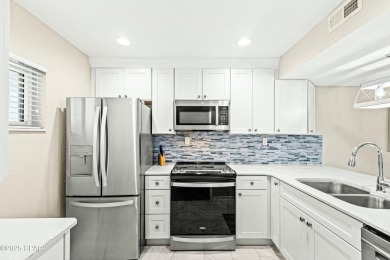 Discover a hidden gem in the heart of Panama City Beach--Leisure on Holiday Golf Club in Florida - for sale on GolfHomes.com, golf home, golf lot