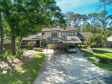 Welcome to this beautifully updated 2 bedroom, 2 and a half bath on East Lake Woodlands Country Club in Florida - for sale on GolfHomes.com, golf home, golf lot