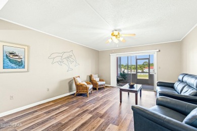 Discover a hidden gem in the heart of Panama City Beach--Leisure on Holiday Golf Club in Florida - for sale on GolfHomes.com, golf home, golf lot