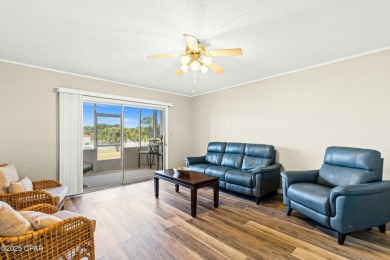 Discover a hidden gem in the heart of Panama City Beach--Leisure on Holiday Golf Club in Florida - for sale on GolfHomes.com, golf home, golf lot