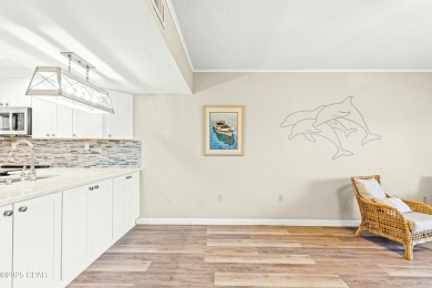 Discover a hidden gem in the heart of Panama City Beach--Leisure on Holiday Golf Club in Florida - for sale on GolfHomes.com, golf home, golf lot