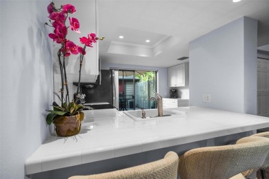 Welcome to this beautifully updated 2 bedroom, 2 and a half bath on East Lake Woodlands Country Club in Florida - for sale on GolfHomes.com, golf home, golf lot