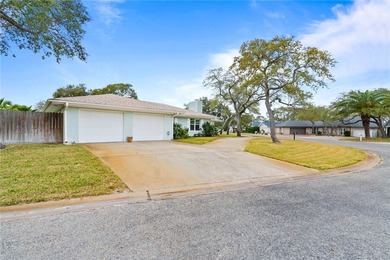 Welcome to this beautifully maintained corner-lot home in the on Rockport Country Club in Texas - for sale on GolfHomes.com, golf home, golf lot