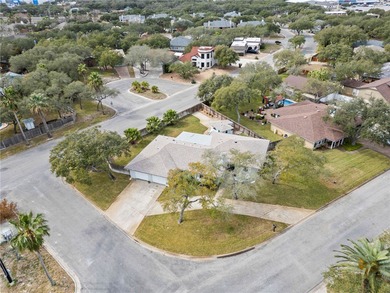 Welcome to this beautifully maintained corner-lot home in the on Rockport Country Club in Texas - for sale on GolfHomes.com, golf home, golf lot