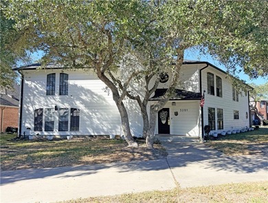 This classic-style 2-story residence is a statement of elegance on Rockport Country Club in Texas - for sale on GolfHomes.com, golf home, golf lot