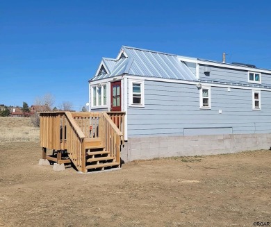 Welcome to your dream tiny home! This enchanting 334 sq ft tiny on Walsenburg Golf Club in Colorado - for sale on GolfHomes.com, golf home, golf lot