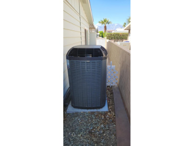 This spacious 2-bedroom, 2- bath residence is situated on a on Palm Desert Greens Country Club in California - for sale on GolfHomes.com, golf home, golf lot