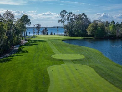 Tucked within an enclave of charming villas along Lake Nona's on Lake Nona Golf Club, Inc. in Florida - for sale on GolfHomes.com, golf home, golf lot