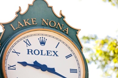 One or more photo(s) has been virtually staged. Tucked within an on Lake Nona Golf Club, Inc. in Florida - for sale on GolfHomes.com, golf home, golf lot
