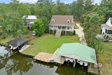 THE VIEW!! Quiet  Peaceful. BOATING!! Covered boat house with 2 on Cypress Country Club and Golf Club  in Alabama - for sale on GolfHomes.com, golf home, golf lot