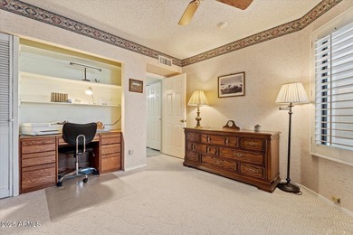 Step into this fully furnished, move-in-ready 2-BD END-UNIT on Fountain of the Sun Country Club in Arizona - for sale on GolfHomes.com, golf home, golf lot