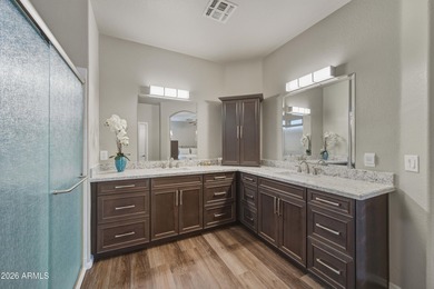 Morning light spills across manicured greens, greeting the day on Springfield Golf Resort in Arizona - for sale on GolfHomes.com, golf home, golf lot