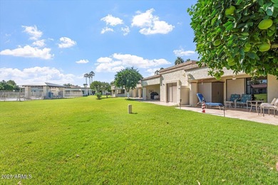 Step into this fully furnished, move-in-ready 2-BD END-UNIT on Fountain of the Sun Country Club in Arizona - for sale on GolfHomes.com, golf home, golf lot