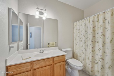 Morning light spills across manicured greens, greeting the day on Springfield Golf Resort in Arizona - for sale on GolfHomes.com, golf home, golf lot