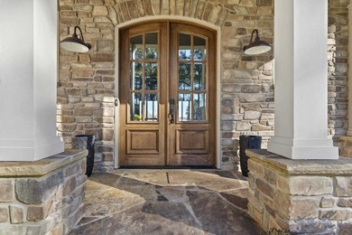 Stunning lakefront retreat in Cuscowilla on Lake Oconee on The Golf Club at Cuscowilla in Georgia - for sale on GolfHomes.com, golf home, golf lot