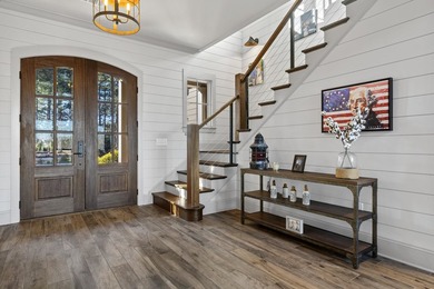 Stunning lakefront retreat in Cuscowilla on Lake Oconee on The Golf Club at Cuscowilla in Georgia - for sale on GolfHomes.com, golf home, golf lot