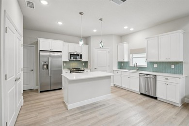 Welcome to this beautifully built 2023 Johnson Group Homes *Key on Venetian Bay Golf Course in Florida - for sale on GolfHomes.com, golf home, golf lot