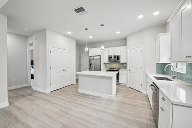 Welcome to this beautifully built 2023 Johnson Group Homes *Key on Venetian Bay Golf Course in Florida - for sale on GolfHomes.com, golf home, golf lot