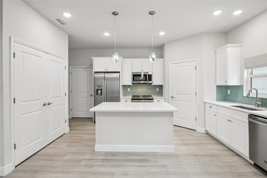 Welcome to this beautifully built 2023 Johnson Group Homes *Key on Venetian Bay Golf Course in Florida - for sale on GolfHomes.com, golf home, golf lot