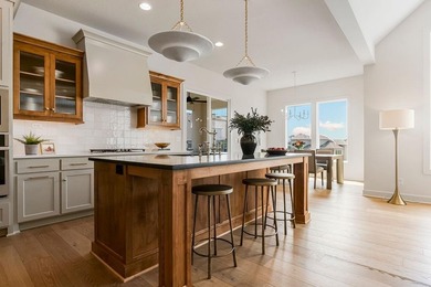 The Sequoia floor plan is a reverse 1.5-story home that offers on Heritage Park Golf Course in Kansas - for sale on GolfHomes.com, golf home, golf lot