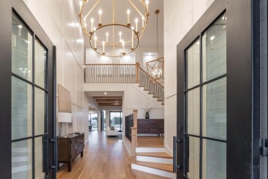 This exceptional Lake ray Hubbard residence is one of the rare on Heath Golf and Yacht Club in Texas - for sale on GolfHomes.com, golf home, golf lot