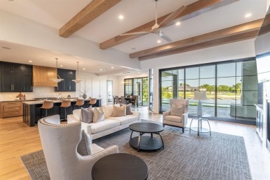 This exceptional Lake ray Hubbard residence is one of the rare on Heath Golf and Yacht Club in Texas - for sale on GolfHomes.com, golf home, golf lot