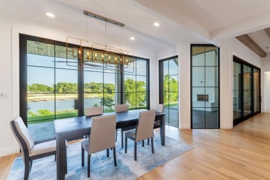This exceptional Lake ray Hubbard residence is one of the rare on Heath Golf and Yacht Club in Texas - for sale on GolfHomes.com, golf home, golf lot