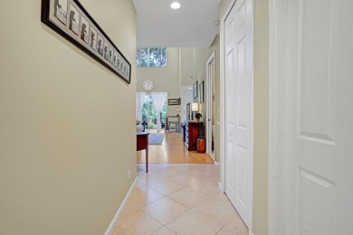 Discover the ultimate lifestyle in this spacious townhome on The Legacy Golf and Tennis Club in Florida - for sale on GolfHomes.com, golf home, golf lot