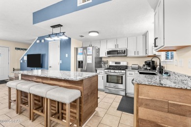 UNDER CONTRACT - ACCEPTING BACKUP OFFERS. This fully remodeled on Edgewater Beach Resort in Florida - for sale on GolfHomes.com, golf home, golf lot