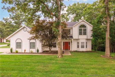 This well-maintained residence boasts a myriad of desirable on The Oaks Golf Course in Missouri - for sale on GolfHomes.com, golf home, golf lot