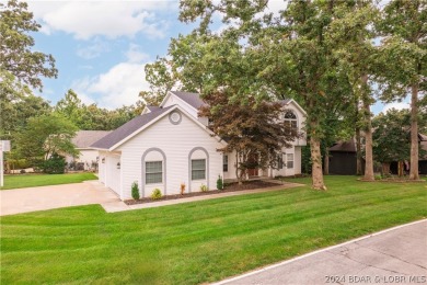 This well-maintained residence boasts a myriad of desirable on The Oaks Golf Course in Missouri - for sale on GolfHomes.com, golf home, golf lot