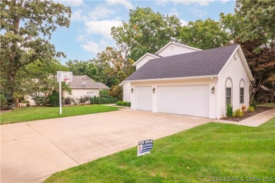 This well-maintained residence boasts a myriad of desirable on The Oaks Golf Course in Missouri - for sale on GolfHomes.com, golf home, golf lot