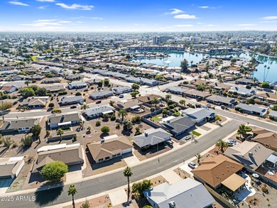 Welcome to your beautifully updated, turnkey furnished home in on Sun City Lakes West and East in Arizona - for sale on GolfHomes.com, golf home, golf lot