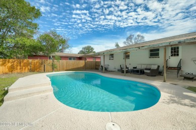 This well-maintained 1960s concrete block home blends classic on Blue Cypress Golf Club in Florida - for sale on GolfHomes.com, golf home, golf lot