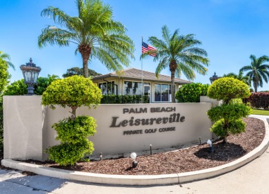 Nestled within 55+ Palm Beach Leisureville, this expanded on Leisureville Community Golf Course in Florida - for sale on GolfHomes.com, golf home, golf lot