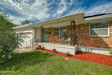 This well-maintained 1960s concrete block home blends classic on Blue Cypress Golf Club in Florida - for sale on GolfHomes.com, golf home, golf lot