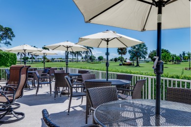 Nestled within 55+ Palm Beach Leisureville, this expanded on Leisureville Community Golf Course in Florida - for sale on GolfHomes.com, golf home, golf lot