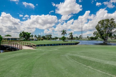 Nestled within 55+ Palm Beach Leisureville, this expanded on Leisureville Community Golf Course in Florida - for sale on GolfHomes.com, golf home, golf lot