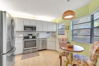 Step inside this light & bright condo to find yourself in a on The Links At Boynton Beach - The Family Course in Florida - for sale on GolfHomes.com, golf home, golf lot