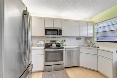 Step inside this light & bright condo to find yourself in a on The Links At Boynton Beach - The Family Course in Florida - for sale on GolfHomes.com, golf home, golf lot