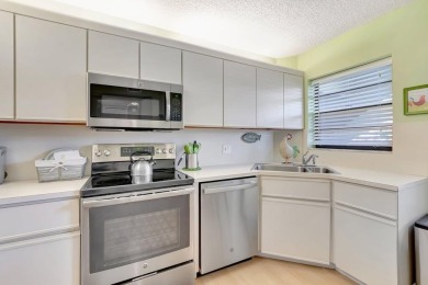 Step inside this light & bright condo to find yourself in a on The Links At Boynton Beach - The Family Course in Florida - for sale on GolfHomes.com, golf home, golf lot